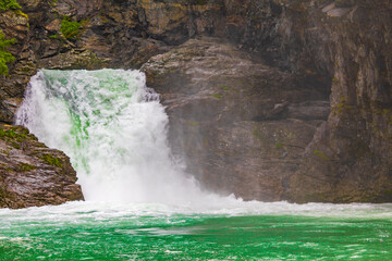 Beautiful Høljafossen waterfall turquoise water Utladalen Norway most beautiful landscapes.