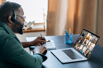 Business brainstorm, online video meeting, virtual conference with multiracial colleagues. African...
