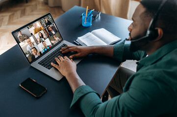 Business brainstorm, online video meeting, virtual conference with multiracial colleagues. African...