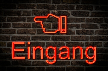 Fototapeta premium Leuchtreklame Eingang