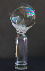 Interference of light in a bubble film.
The changing thickness of the soap film creates conditions...
