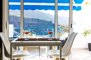 A glass of wine sitting on top of a table