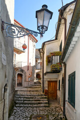 An alley between the old stone houses of Sassinoro, a medieval village in the province of Benevento.