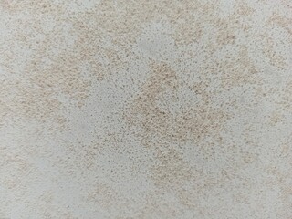Textured matte background, beige color.