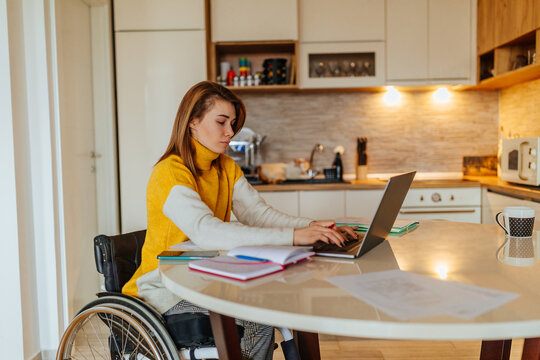 Woman with disabilities working at home