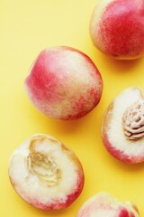 nectarines on a yellow background