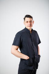 Fototapeta premium Close-up portrait of a young male doctor in medical clothes.