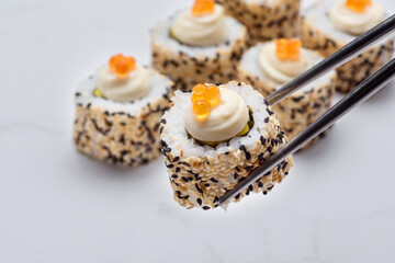 Roll with shrimp tempura, seads, caviar