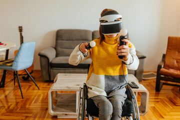 Woman in wheelchair using virtual reality simulator