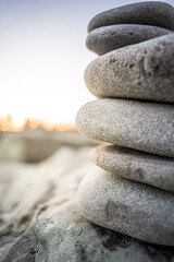 Stones in front of a sunset