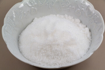 Sugar in a ramekin for cooking a cake