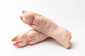 Fresh pig trotters on pure white background