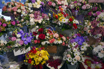 showcase of various bouquets in a flower shop
