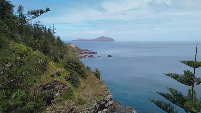 Locked Off Stationary Motion Of High Cliffs And Colourful Scenery Near Rocky Point On Western Side Of Island With Phillip Island In Background, Kingston, Norfolk Island, Australia