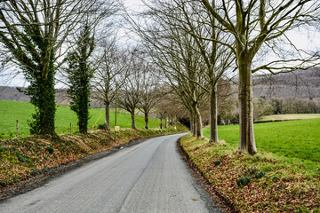 Fototapeta na wymiar A rural road in wintertime Wales.