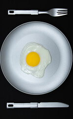 fried egg on a frying pan
