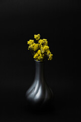 bouquet of yellow flowers in a vase