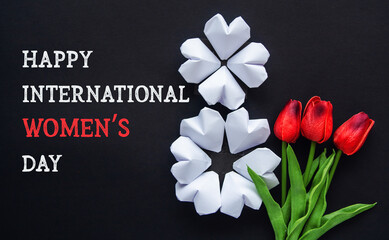 Happy Internationa Women's Day greeting card, March 8 or birthday Number eight 8 from paper hearts and tulip flowers on dark