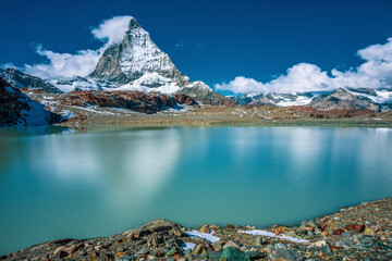 Panoramic view of Matterhorn peak, Switzerland..Matterhorn reflection in the Theodul glacier lake.