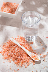 pink himalayan salt, in bowl on white background
