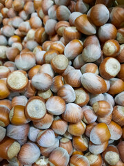 Dried unshelled hazelnuts seeds of Whole nuts as background. Macro Organic Hazelnut.
