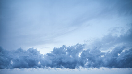 Naklejka na ściany i meble A landscape shows cloudy sky in a rainy day 