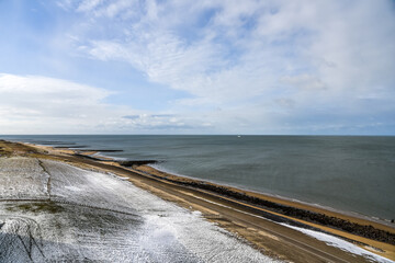 The beach with its breakwaters on a winter day.