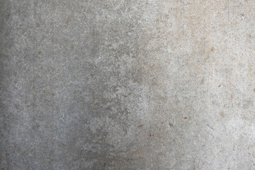 old light gray concrete wall with granular structure. rough surface texture