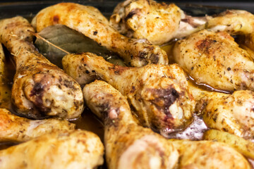 Baked chicken thighs with sauce and vegetables