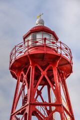 Lighthouse and harbour lights of the harbour of Den Oever, The Netherlands.