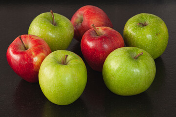 Red and green apples in the kitchen