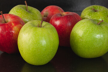 Red and green apples in the kitchen