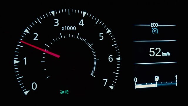 Close up shot of a speedometer in a car in motion. 
Speed in Km/h is shown on the display.