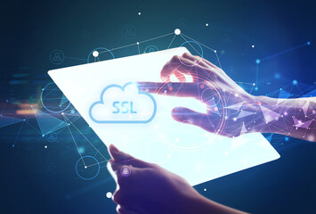 Hand holdig futuristic tablet with SSL inscription, modern technology concept