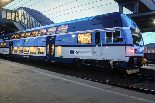 OSTRAVA, CZECHIA - APRIL 5, 2014: Double decker train, a city elephant, ready for a commuter suburban train, on the platforms of Ostrava Hlavni Nadrazi train station, belonging to Ceske Drahy CD