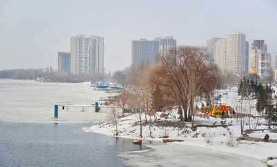 Kyiv. Ukraine. Spring thaw. Dnieper River is freeing from ice. 