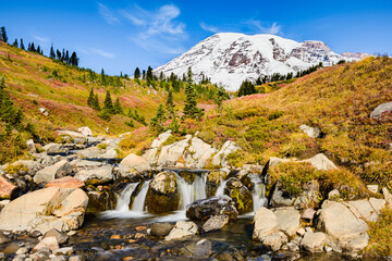 Edith Creek in the Fall at Mount Rainier National park flows happily below the active volcanic...