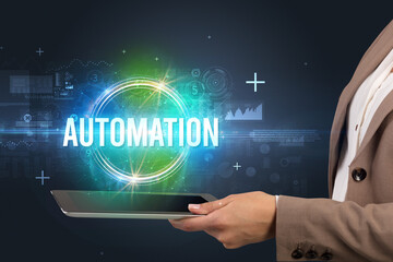 Close-up of a touchscreen with AUTOMATION inscription, new technology concept