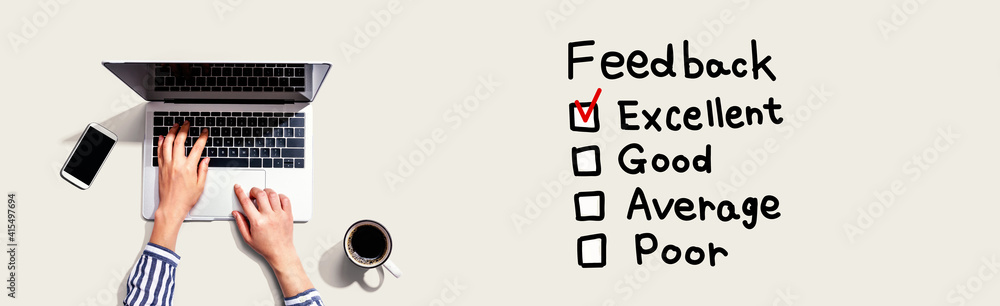Poster feedback with person using a laptop computer
