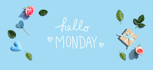 Hello Monday message with a small gift box and roses