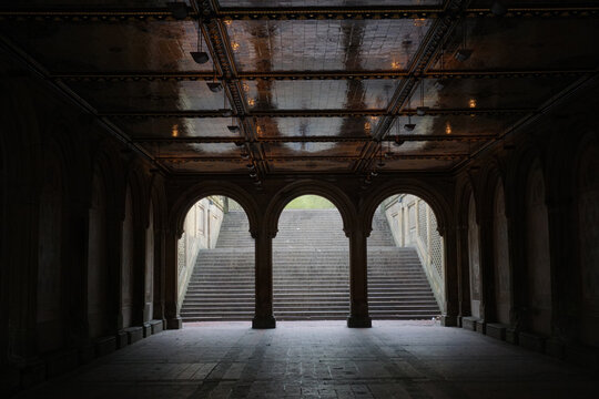 arched tunnel to the lower level of Bethesda Terrace in Central Park, NYC - Powered by Adobe