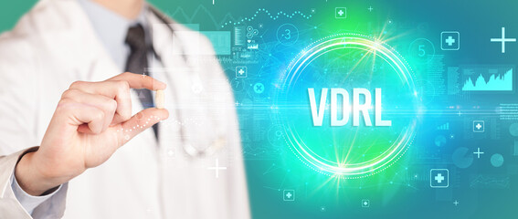 Close-up of a doctor giving you a pill with VDRL abbreviation, virology concept
