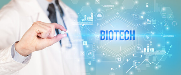 Doctor giving a pill with BIOTECH inscription, new technology solution concept