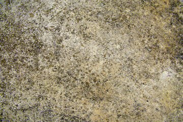 Old cement or concrete outdoor wall with stains and moldy for background and texture.