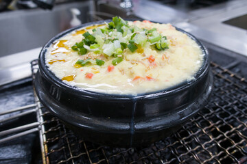 Korean menu that we call steamed egg serve on hot pot.