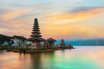 Ulun Danu Beratan Temple is a famous  landmark located on the western side of the Beratan Lake , Bali ,Indonesia. - obrazy, fototapety, plakaty
