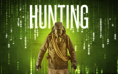 Faceless hacker with HUNTING inscription, hacking concept
