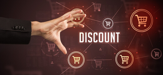 Close-Up of cropped hand pointing at DISCOUNT inscription, online shopping concept