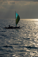 Small sail during sunset