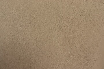 The walls are made of cream stucco, with a rough and rough surface. There is a blank space for the text. Ideas for background.